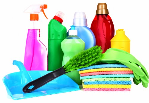 Carpet cleaning operative preparing equipment safely before a job