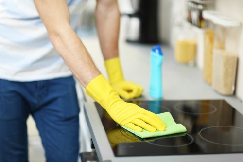 Cleaning team maintaining a tidy office reception in E15